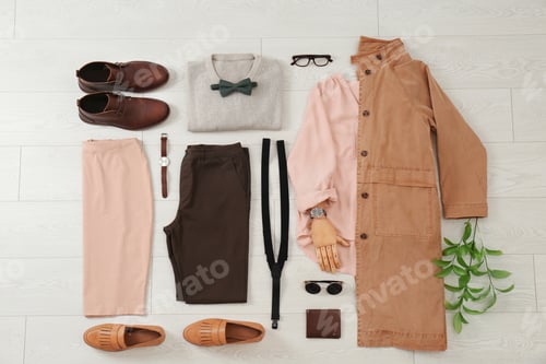 Preview: Flat lay set of stylish clothes and accessories on wooden floor