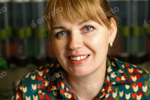 Preview: closeup indoor portrait of beautiful young blonde woman on home background. Blonde woman smiling. Wo