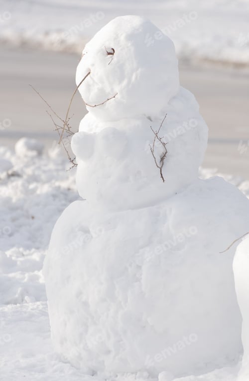 Charming Snowman Created Outdoors on a Sunny Winter Day
