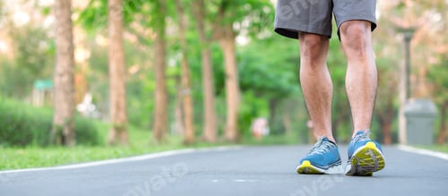 Preview: athlete man with running shoes in the park outdoor