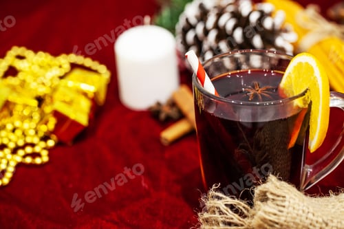 Preview: Hot mulled wine with spices on Christmas background