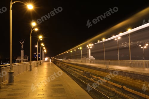 Preview: Night metro railroad with illumination in modern city