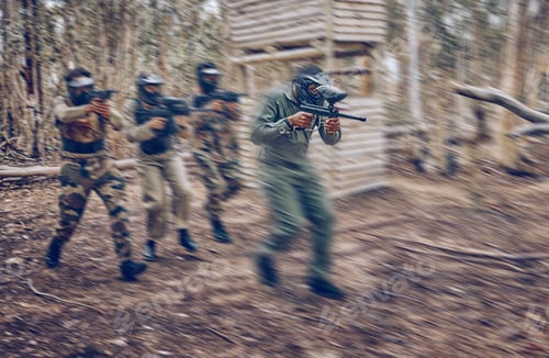 Preview: Paintball, team work or men running in a shooting game with speed or fast action on a fun battlefie