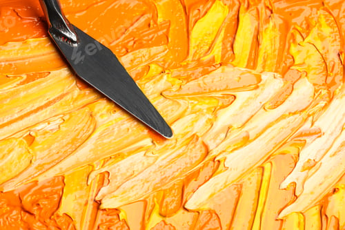 Preview: Beautiful strokes of colorful oil paints and palette knife as background, closeup