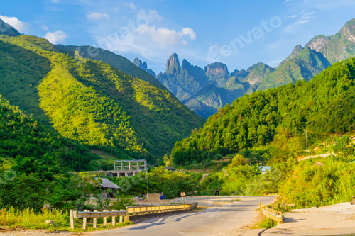 Preview: Fansipan mountain hills valley with forest trees. Panoramic view at Sapa, Vietnam.