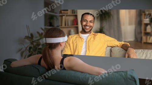 Preview: Diverse Couple Enjoying Video Communication Via Virtual Reality At Home