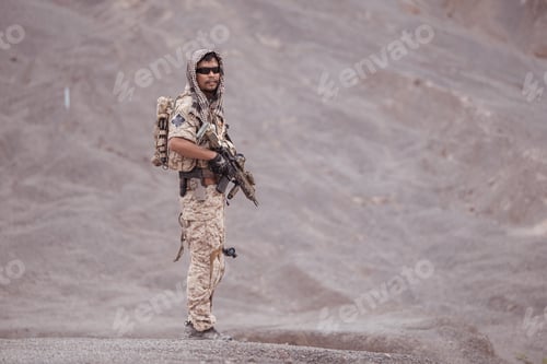 Preview: Soldiers in camouflage military uniforms carrying weapons Reconnaissance missions in rugged mountain