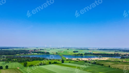 Preview: Windmill turbines in green field, Wind energy concept