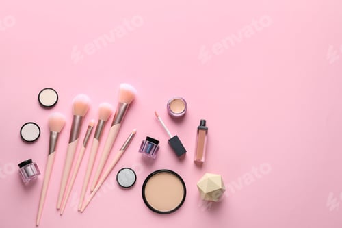 Preview: Flat lay composition with makeup brushes on pink background. Space for text