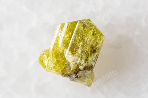 Preview: sample of rough chrysoberyl mineral on white