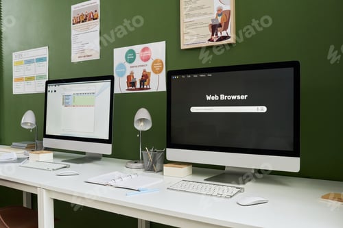 Preview: Modern Computer Workstations Awaiting Students for Literacy Course Training