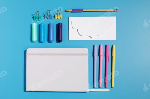 Preview: Bright stationery and school supplies on a blue background. Back to school.