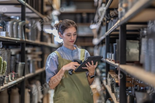 Preview: A Female Entrepreneur in a Family Run Ceramic Business Checking Stock