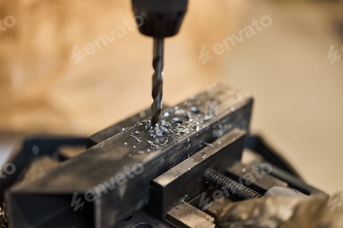 Preview: Close-Up of Metal Drilling Process with Industrial Accuracy and Precision