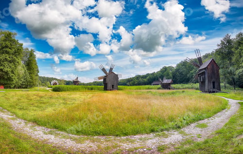 Preview: Amazing summer view of traditional romanian windmill.