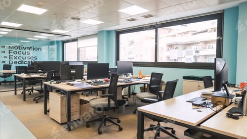 Preview: Interior of unorganized creative workspace with computer desks