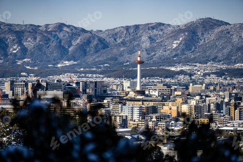 Preview: View of Nidec Kyoto Tower with the city skyline and mountains in the background. Kyoto, Japan