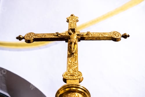 Preview: Gilded crucifix, viewed from below, gloriously decorated to appear wealthy.
