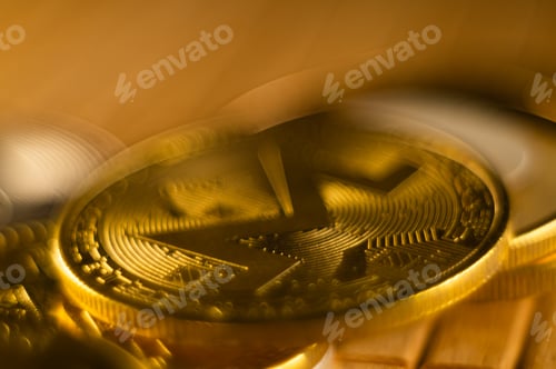 Preview: Closeup shot of cryptocurrency gold cash coin