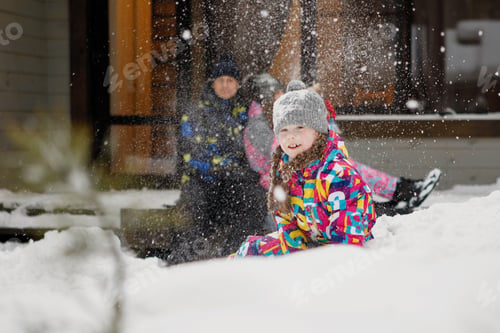 Preview: Teen Girl having fun in the snow in winter