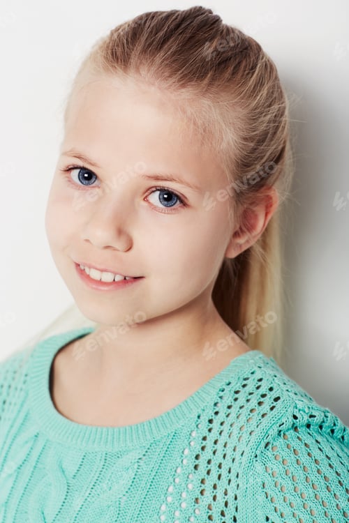 Preview: Giving you a smile. Portrait of a confident young girl standing in the studio.