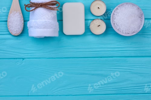 Preview: Bath and spa accessories on blue wood and copy space.