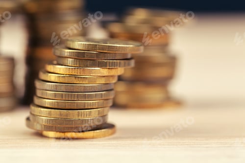 Preview: piles of coins on working table