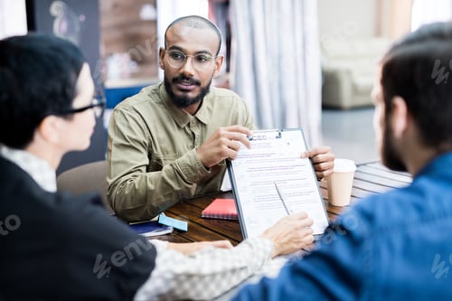 Preview: Business team analyzing strategies at meeting
