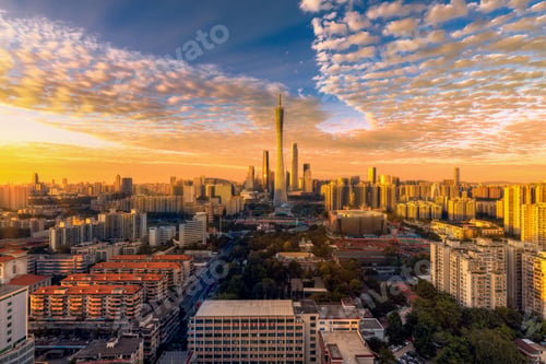 Preview: Guangzhou cityscape with Canton Tower at sunset. China.