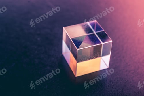 Preview: Closeup shot of a textured glass cube on a purple surface