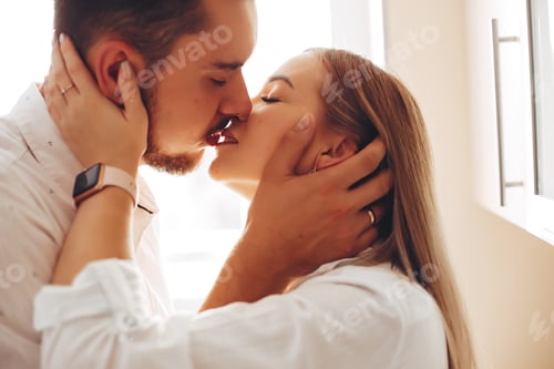 Preview: Couple Embrace with Eyes Closed in White Room
