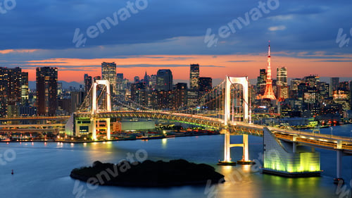 Preview: Rainbow Bridge Spanning Tokyo Bay With Tokyo Tower Visible In The Background.