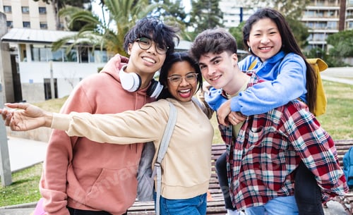 Preview: Cheerful multiracial young students friends standing at campus college