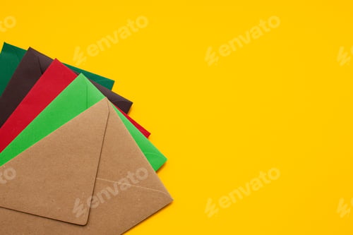 Preview: Red, brown, green envelope on yellow background, with space for text