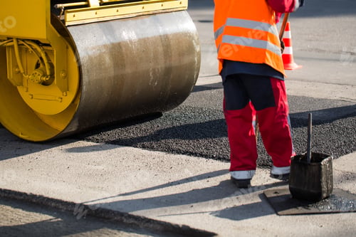 Preview: Road roller compacting asphalt
