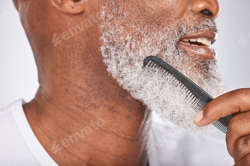 Preview: Elderly, black man with comb for beard, beauty and grooming closeup with face hygiene and cosmetic