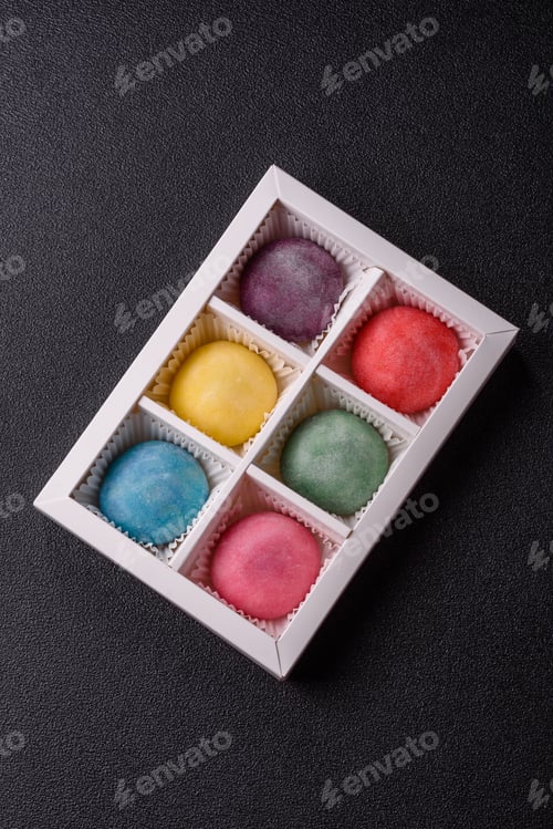 Preview: Japanese mochi, ice cream or Asian sweets with fruit filling. Mochi of different colors