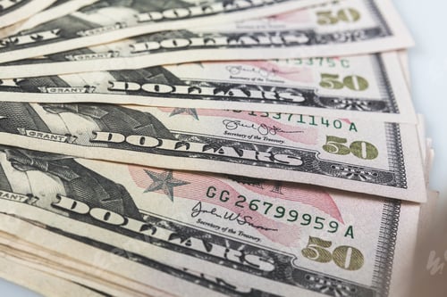 Preview: Closeup shot of a stack of 50 dollar bills