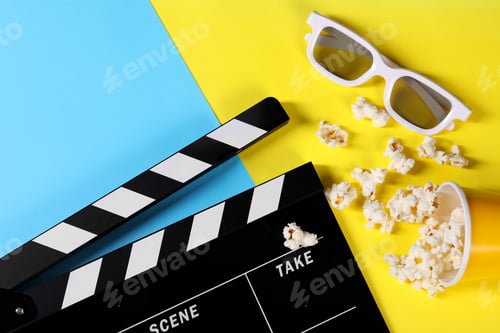Preview: Clapperboard, popcorn and 3D glasses on color background, flat lay
