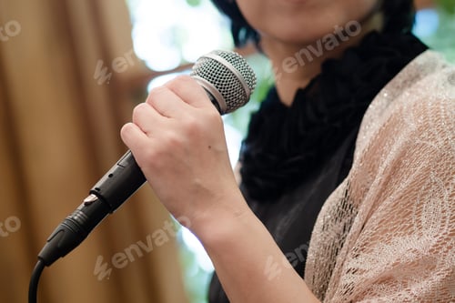 Preview: A Japanese woman speaks at an event.