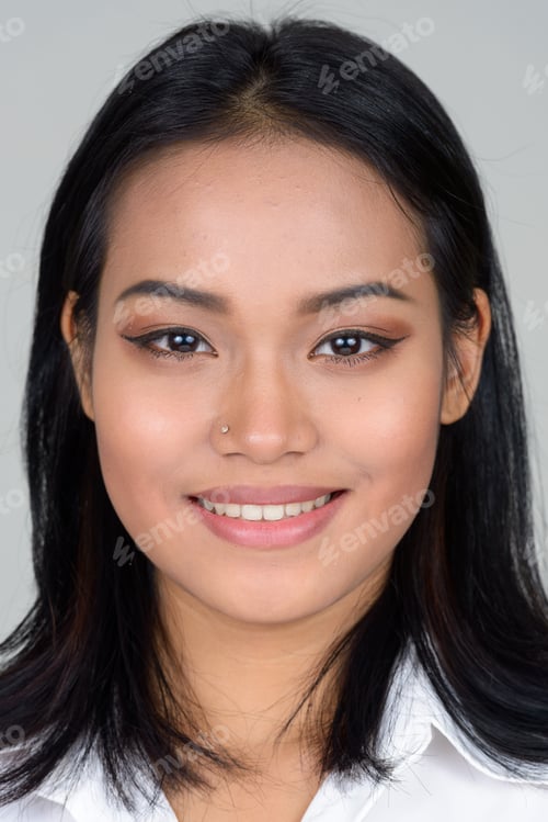Preview: Face of happy young beautiful Asian businesswoman smiling