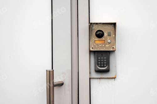 Preview: Vintage keypad access control on industrial door