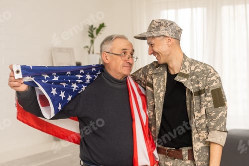 Preview: an elderly father and a military son saluting American flag