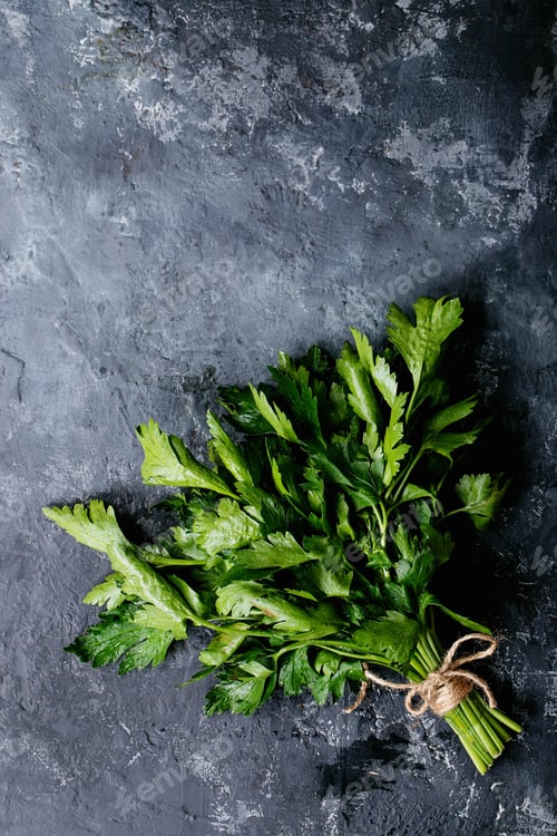 Preview: Fresh coriander on a dark texture background