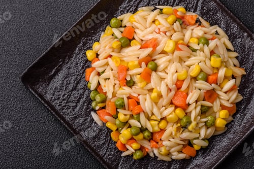 Preview: Delicious boiled rice with vegetables corn, carrots, peas with salt