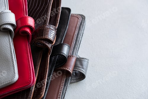 Preview: Selective focus table. Businessman hand write notebook, mobile phone, laptop