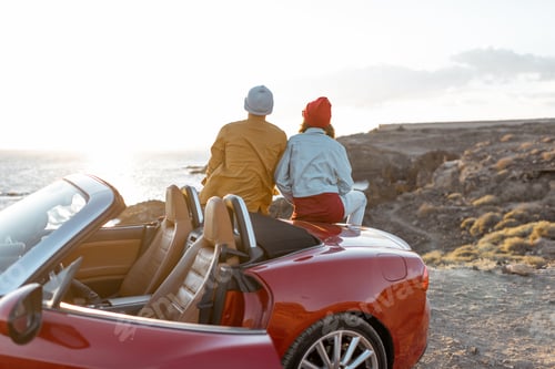 Preview: Lovely couple traveling by car near the ocean