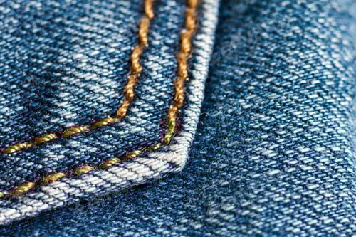 Preview: Detail of blue jeans close up