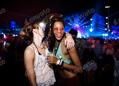 Preview: Friends Enjoying a Music Festival at Night