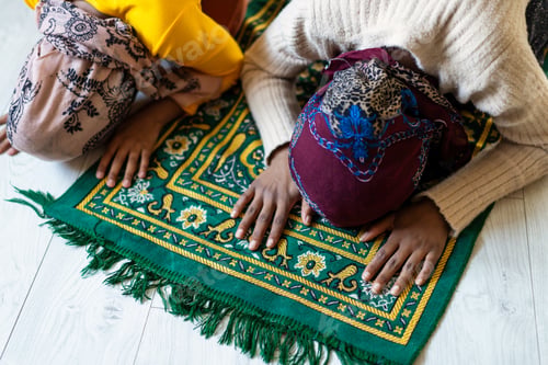 Preview: Hands of muslim people praying during islamic religious prayer